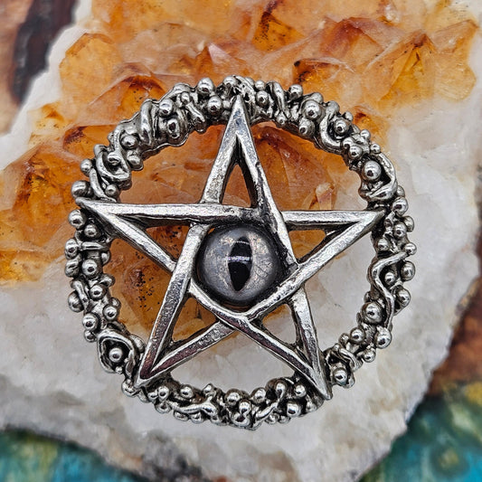 Axel Stocks Pentagram pendant with silver eye.